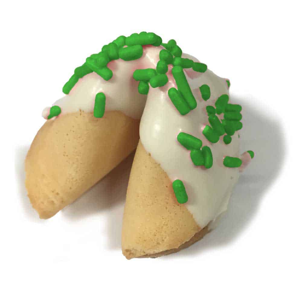 white dipped fortune cookie with green sprinkles