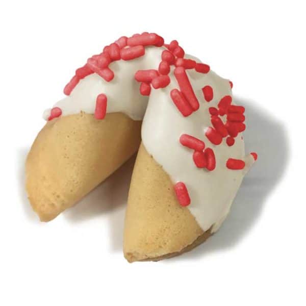 white chocolate dipped fortune cookies with red sprinkles